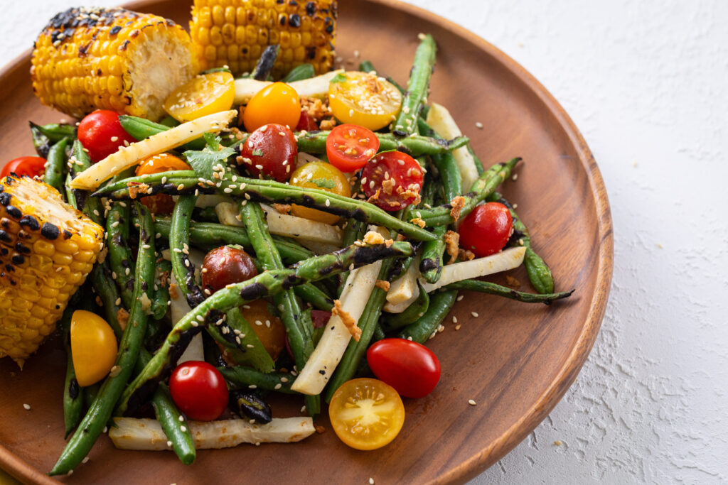 Image for Charred Green Beans with Celery Root, Corn, and Miso Butter Dressing