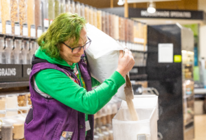 Employee Joker Pours Flour Into Bulk Bin